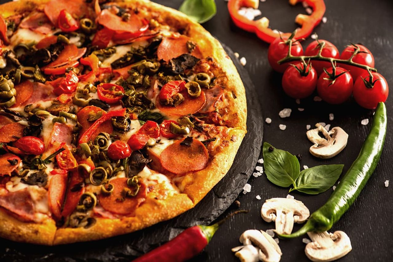 salami pizza by Pizza Riviera